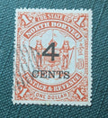 North Borneo $1 stamps dated 1894 overprinted with 4 CENTS in 1899.
